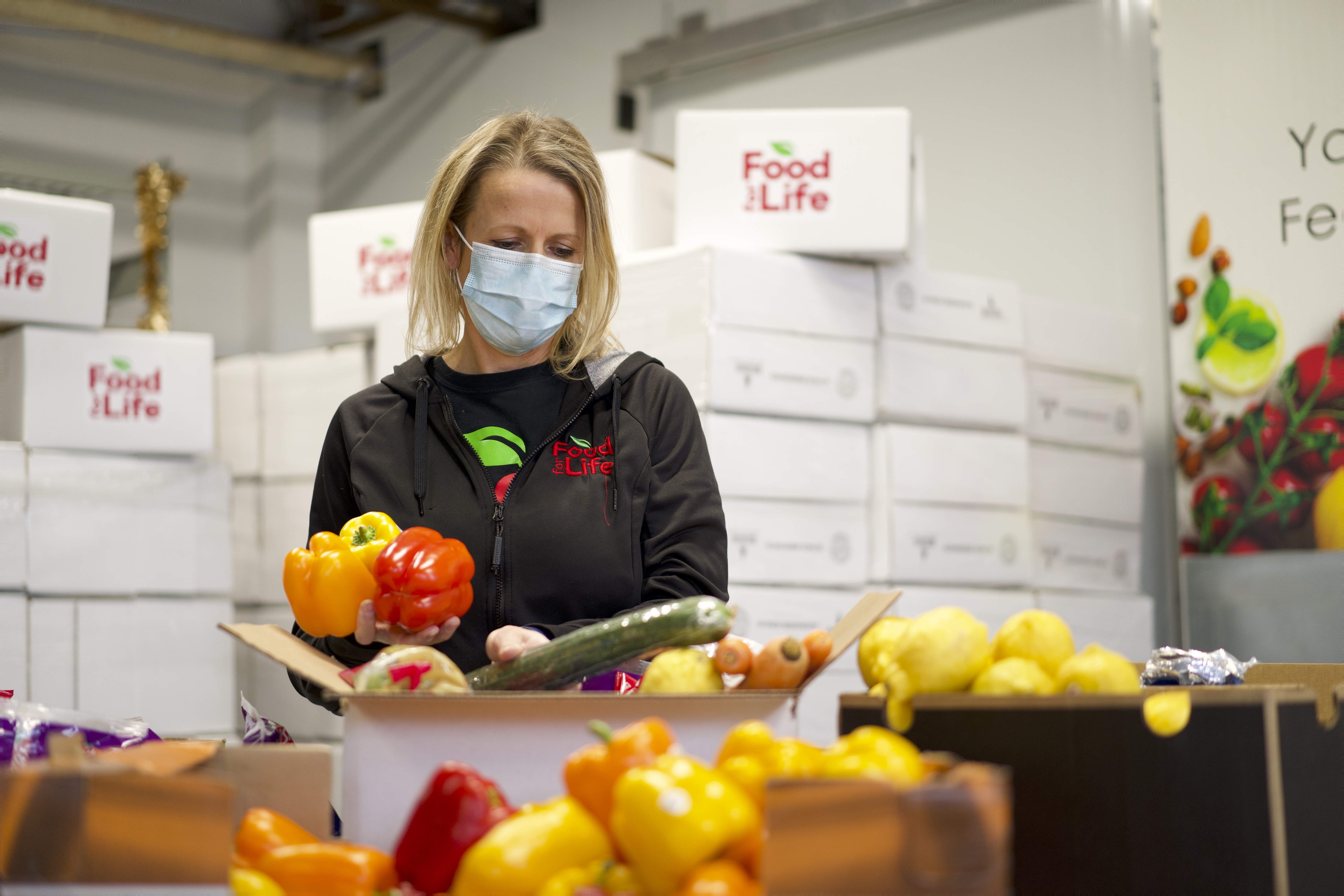 Rescuing good food at Food for Life | Staffers and volunteers sort and package rescued food at Food for Life | Food for Life